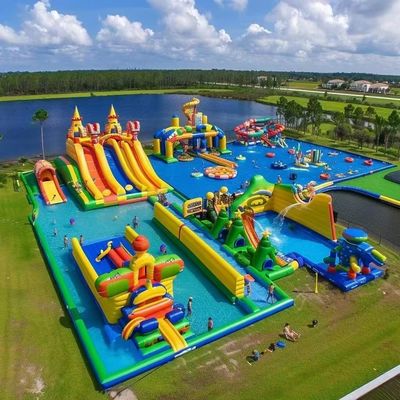 Land Inflatable Water Park With Big Slides And Floating Toys