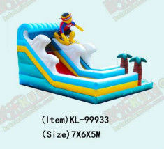 Surfing Themed Inflatable Slide And Palm Tree Decorations